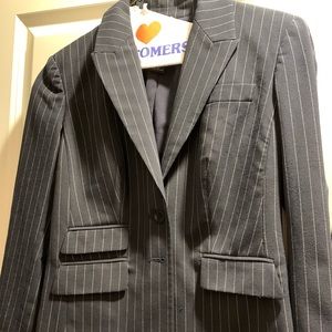 Navy blue pinstripe women’s suit